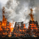 5,250 rifles and pistols confiscated over the last nine years were set alight.